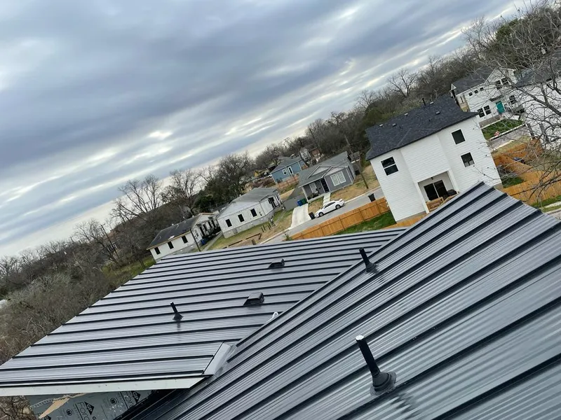 Standing seam metal roof panels with vents for Skylight Repair in Maywood